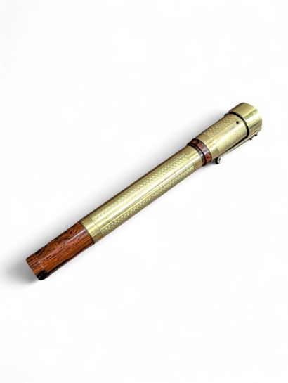Stylo-plumes avec fût gainé d'or jaune 18K...