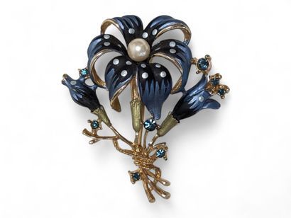 Grande broche Hémérocaille en métal doré...