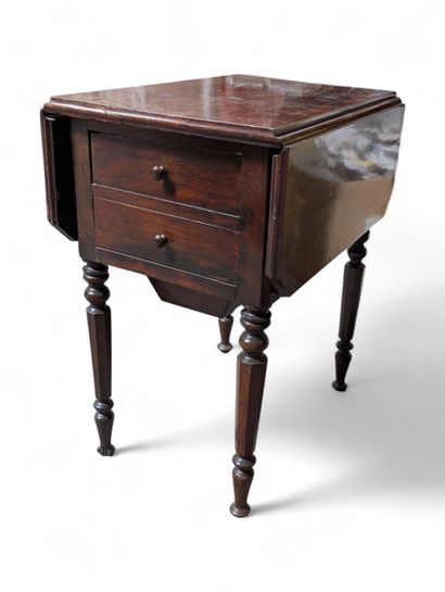Table travailleuse à volets en acajou et...