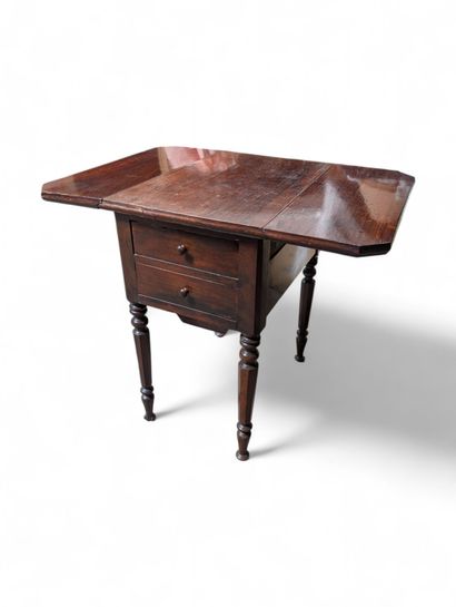 Table travailleuse à volets en acajou et...