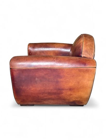 Paire de fauteuils Club vintage en cuir cognac...