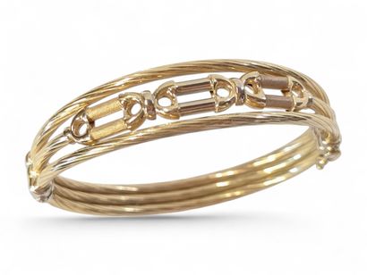 Bracelet manchette en or jaune et blanc 18K...