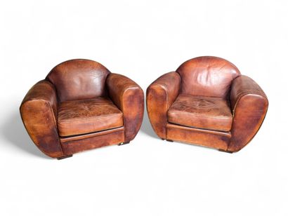 Paire de fauteuils Club vintage en cuir cognac...