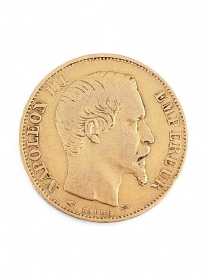 Une pièce de 20 Francs or Napoléon III tête...