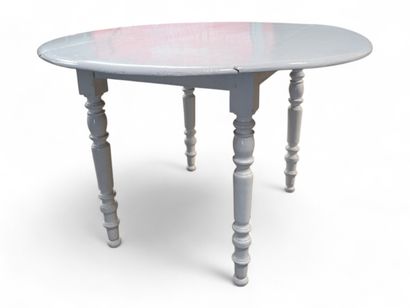 Table à volets en chêne mouluré et entièrement...
