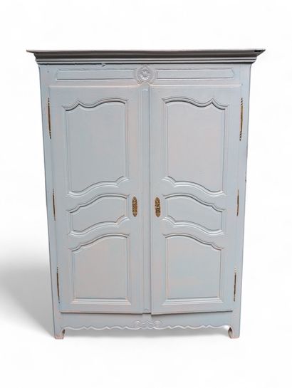 Armoire de chambre en chêne mouluré et sculpté...