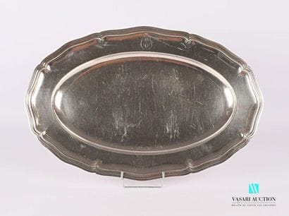 Oval serving platter, the edge with contoured...