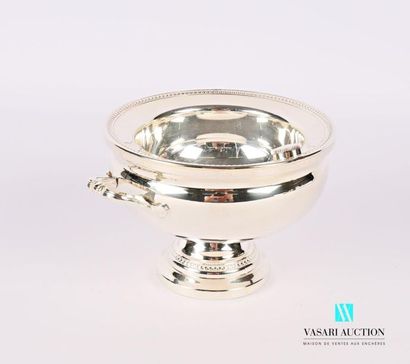 Silver plated metal broth resting on a pedestal...