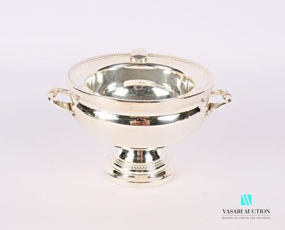 Silver plated metal broth resting on a pedestal...
