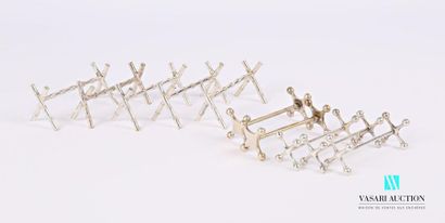 Set of five silver plated metal knife holders...