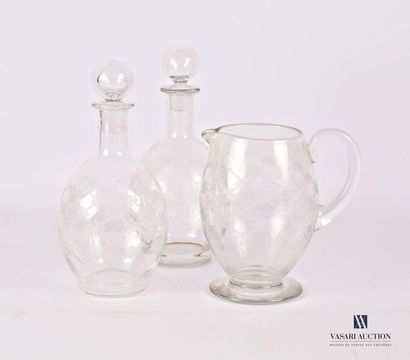 Pair of carafes and a crystal jug with alternating...