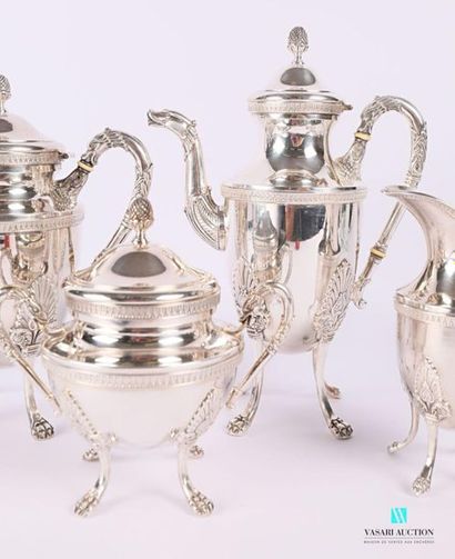Tea and coffee service in silvery metal resting...