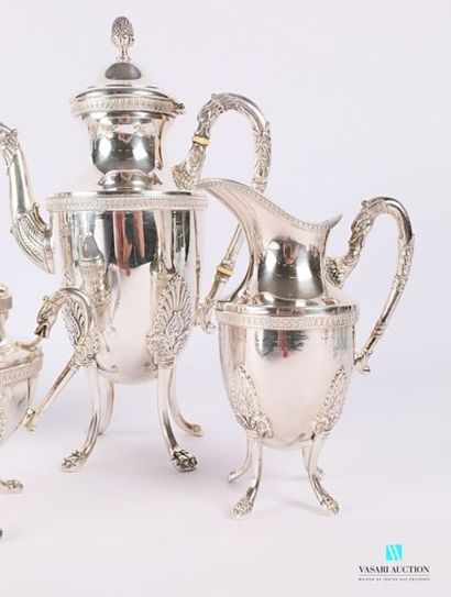 Tea and coffee service in silvery metal resting...