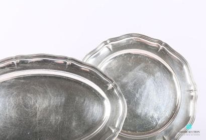 Two silver-plated metal dishes, one round,...