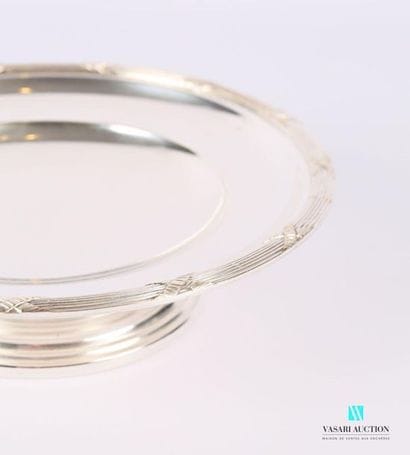 Plate mounted in silver plated metal resting...