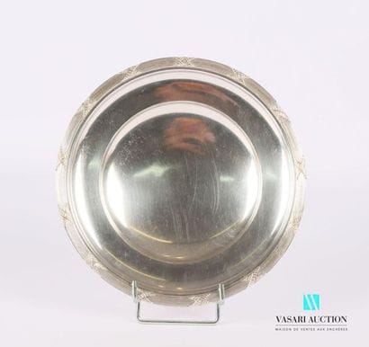 Plate mounted in silver plated metal resting...