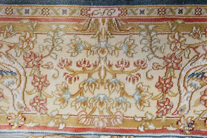 HEREKE

Silk carpet with a decoration in...
