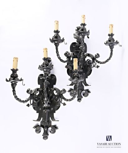 An important pair of wrought iron wall lights,...