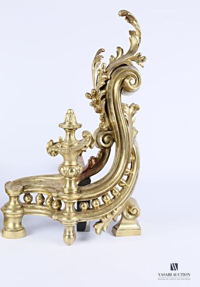 Pair of bronze andirons presenting a baluster-shaped...