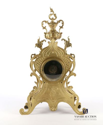 Varnished bronze clock, the round white enamelled...