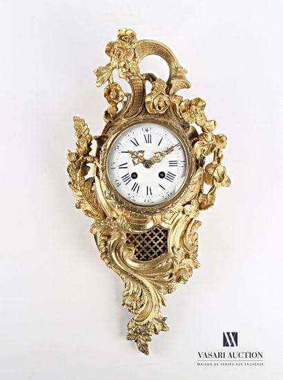 Gilded bronze applique cartel, the white...