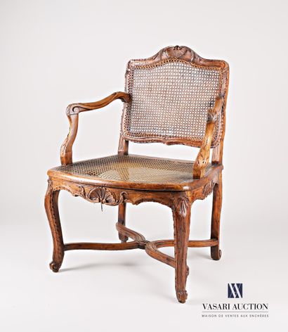 Armchair in natural wood, moulded and carved,...