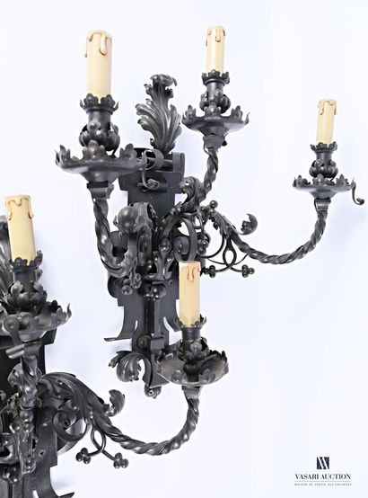 An important pair of wrought iron wall lights,...