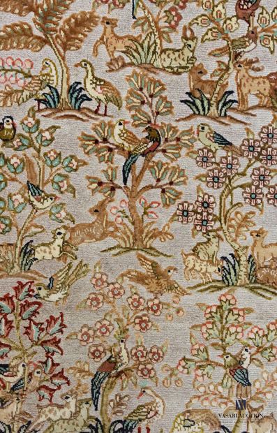 Pair of silk carpets decorated in its center...