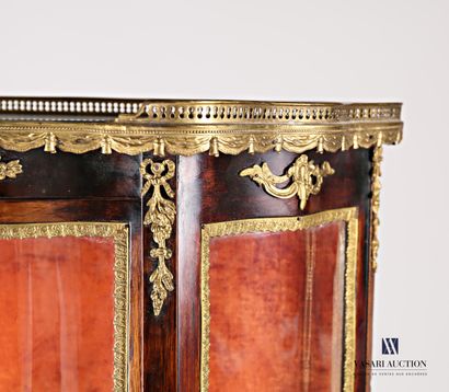 Natural wood and veneer showcase, it is topped...