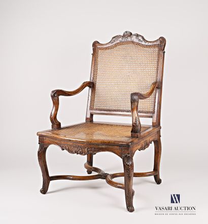Armchair in natural wood, moulded and sculpted,...