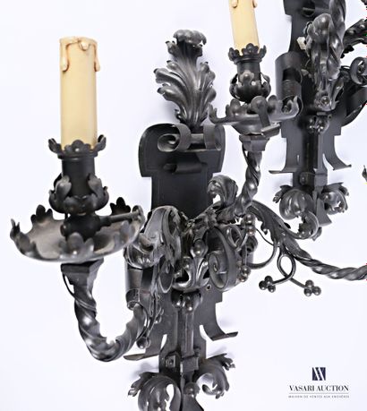 An important pair of wrought iron wall lights,...