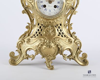 Varnished bronze clock, the round white enamelled...