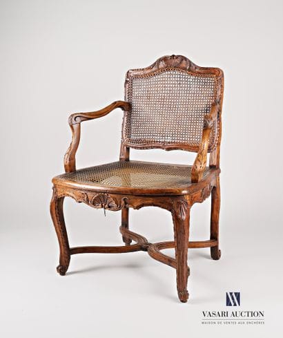 Armchair in natural wood, moulded and carved,...