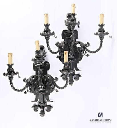 An important pair of wrought iron wall lights,...