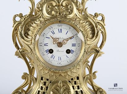 Varnished bronze clock, the round white enamelled...