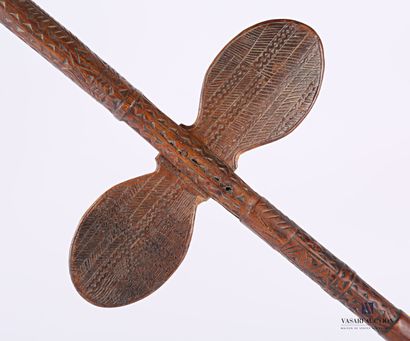 Carved and engraved wooden shaft with carved...