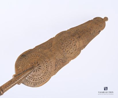 Wooden cattail with a lanceolate palette...
