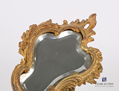 The bevelled mirror, with its bevelled shape,...