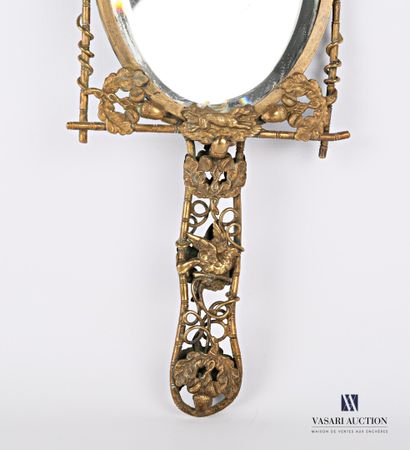 Face to hand in bronze, the mirror with bevelled...
