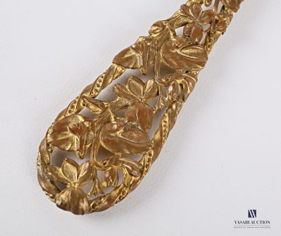 Facing a brass hand, the bevelled oval view...