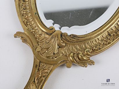 Face to hand in bronze, the mirror with a...