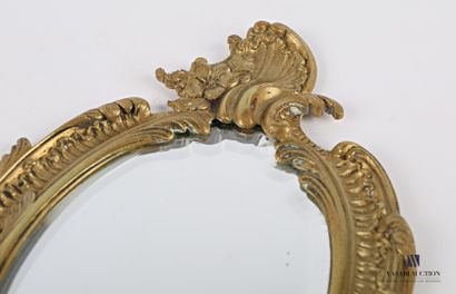 Face to hand in bronze, the mirror with a...