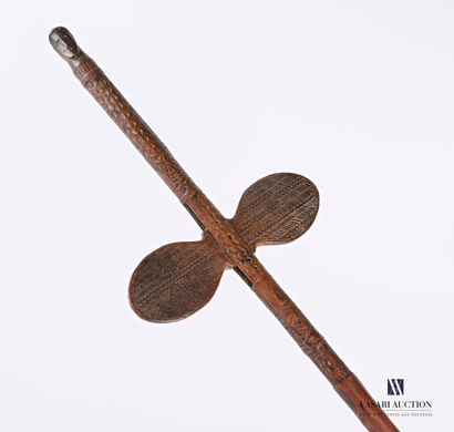Carved and engraved wooden shaft with carved...