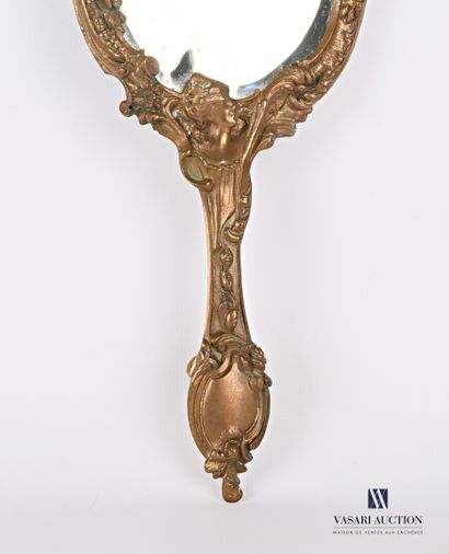 Face to hand in bronze, the bevelled mirror...