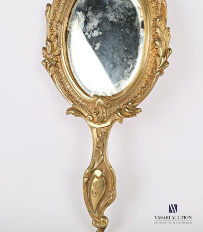 Face to hand in bronze, the bevelled oval...