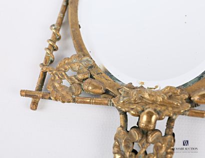 Face to hand in bronze, the mirror with bevelled...