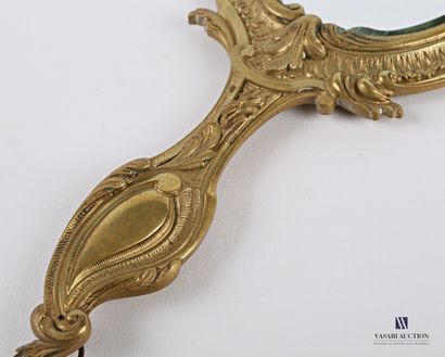 Face to hand in bronze, the mirror with a...