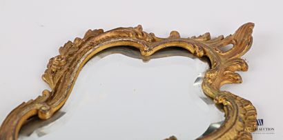 The bevelled mirror, with its bevelled shape,...