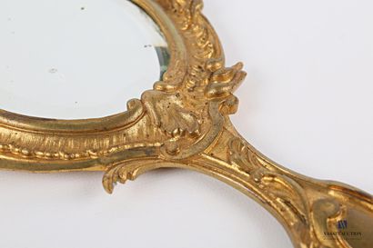 Face to hand in bronze, the mirror with a...
