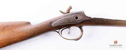 Meeting of a stick and a barrel of rifle...